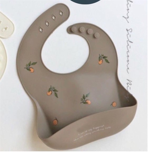 Trickholic Yếm Silicone Mango nền Nâu