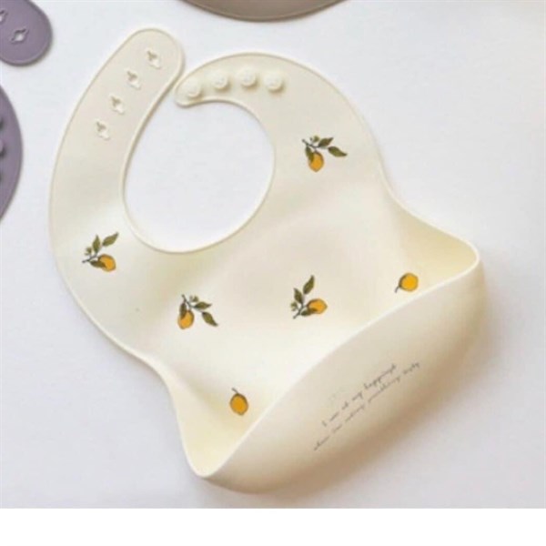 Trickholic Yếm Silicone Mango nền Trắng kem